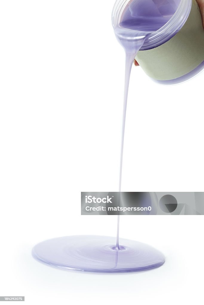 Heated lavander wax poured from bottle Heated lavander wax poured from bottle. Beauty Stock Photo