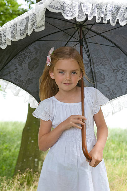istock girl with umbrella 184292184