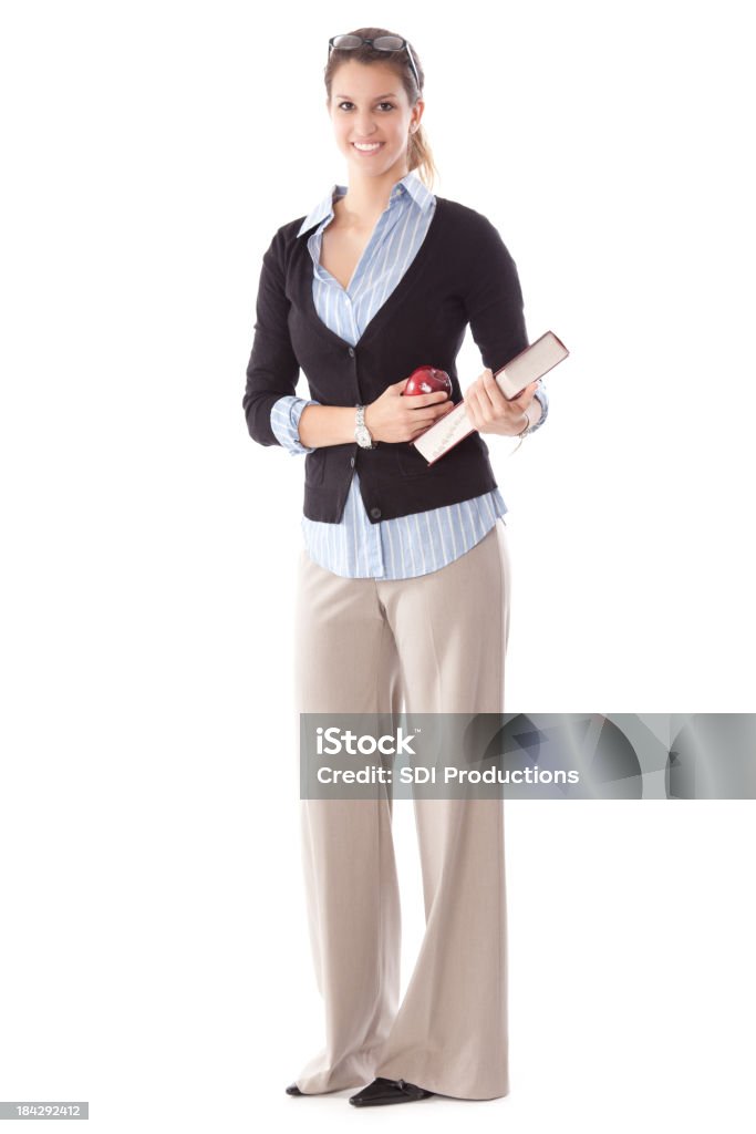 Jovem mulher professora segurando o Apple e reservar - Foto de stock de Professor royalty-free