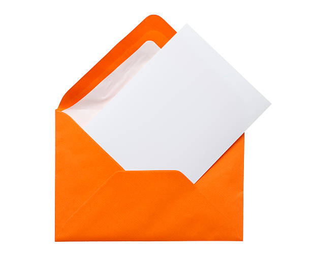 Orange envelope with a white piece of paper inside stock photo