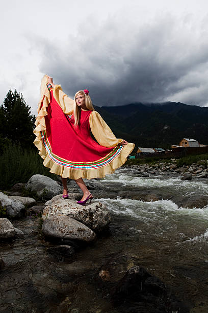 istock woman in long red dress 184292900