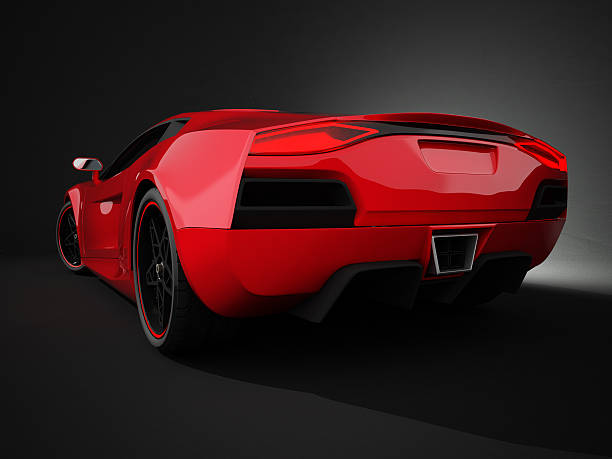 istock Red sport car on black studio background 184292990