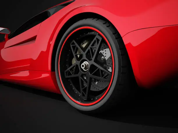 This red sport car is a concept design is made by myself. Wheel and tyre style are concept design too. This super sport car comes without any manufacture brands but looks like a modern Ferrari or Lamborghini. The image is a CGI.