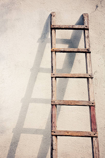 Old wooden ladders stock photo
