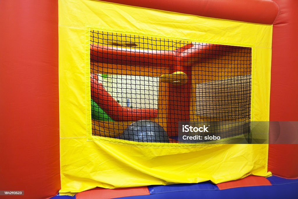 Inflatable Bouncing Playground Inflatable playground indoors. Bouncy Castle Stock Photo
