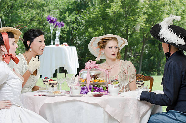 istock Woman having fun at tea party 184293591