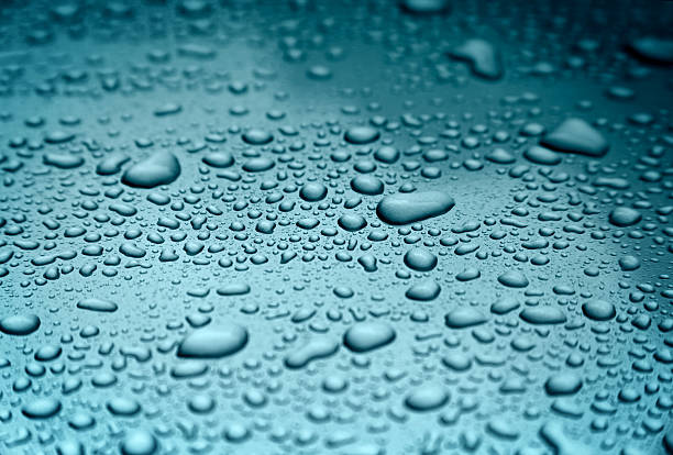 istock Water drops on a polished blue motorhood 184294142