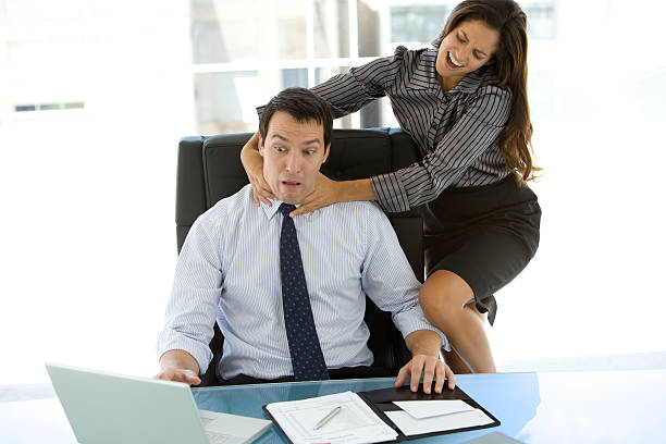 Stress at workplace White collar female strangling busy white collar male woman strangles man stock pictures, royalty-free photos & images