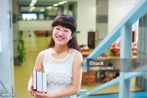 Pretty College Student In The Library Stock Photo - Download Image Now - 20-24 Years, Adult, Adults Only