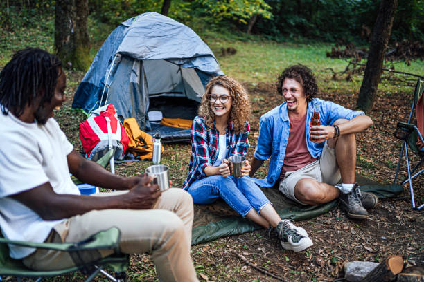 istock Friends camping in the forest together 1842949017