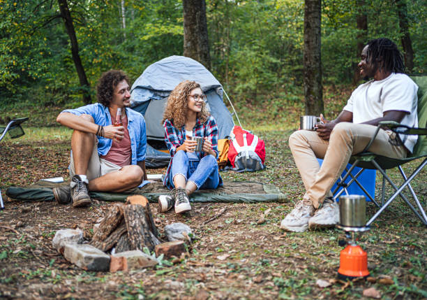 istock Friends camping in the forest together 1842951596