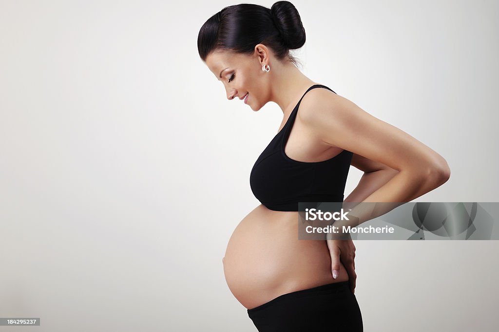 Pregnant beauty Young cheerful pregnant woman posing - XXXL Image 20-29 Years Stock Photo