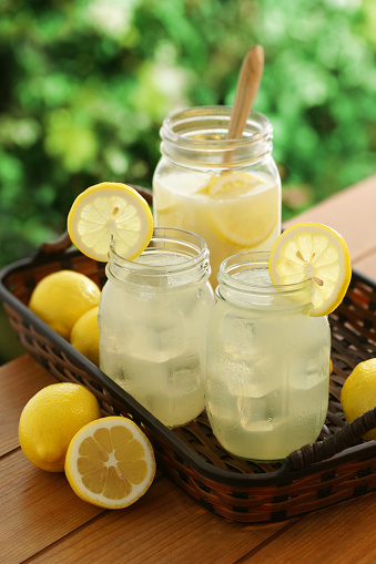 Fresh, ice cold country lemonade in mason jars.