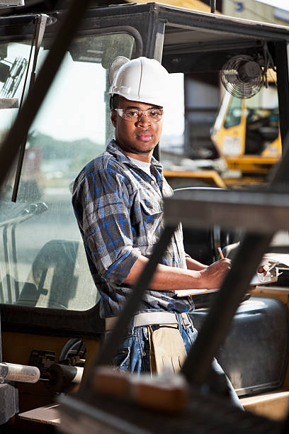 istock African American worker leaning on forklift 184295860