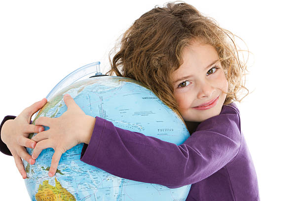 istock Cute little girl hugging a globe 184296122