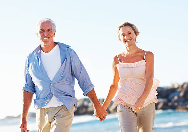 istock Senior couple having a great time on the beach 184296375