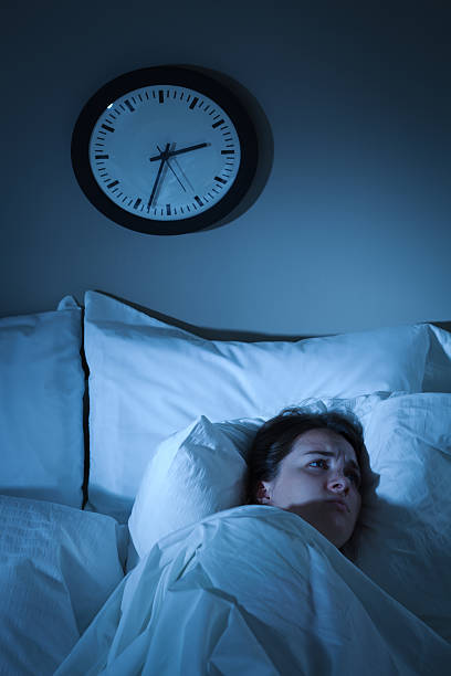 istock Woman with Insomnia Sleeping Problems, Waking Up Stressed in Bed 184296507