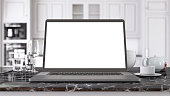 Laptop With Blank Screen On Empty Marble Kitchen Counter