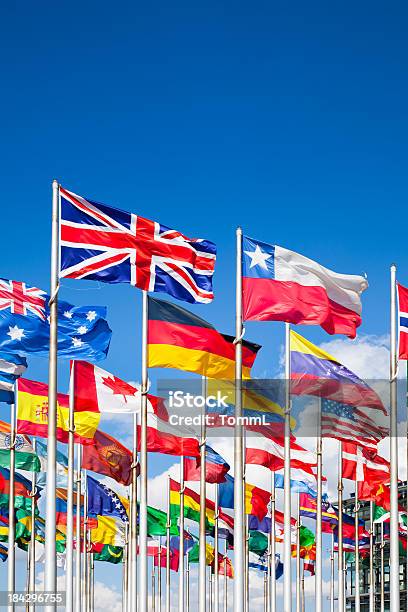 Bandeiras Internacionais - Fotografias de stock e mais imagens de Bandeira Nacional - Bandeira Nacional, Céu, Vento