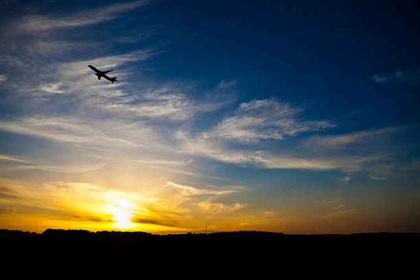 istock Aeroplane taking off in sunset 184296760