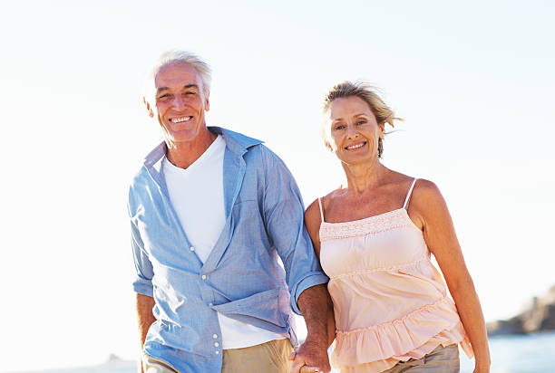 istock Senior couple having fun on the beach 184296950