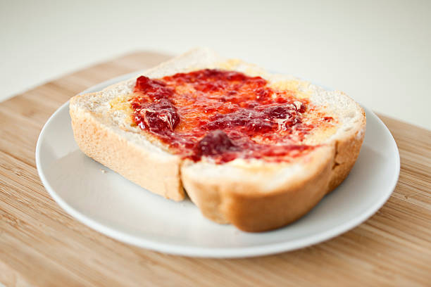 istock Thick white toast with jam and butter 184296986