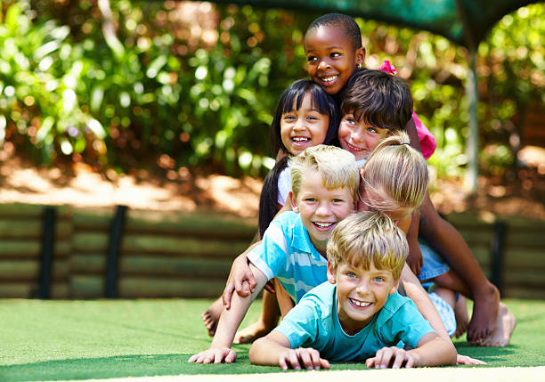 istock Multi ethnic children having fun in the park 184297419