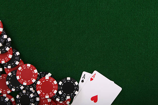 Texas Holdem Poker table with pair of aces and chips. texas hold em photos stock pictures, royalty-free photos & images