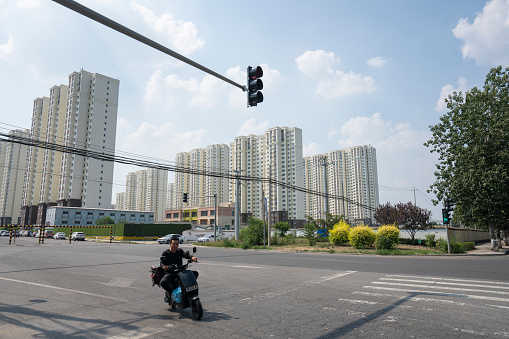 Beijing, China - July 20, 2023: New residential developments on the east side of Chaoyang District in Beijing. China sees a shrinking real estate sector over the coming years.