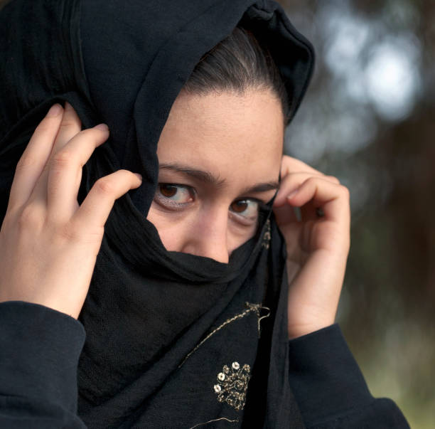 istock Muslim woman in a black veil 184297735