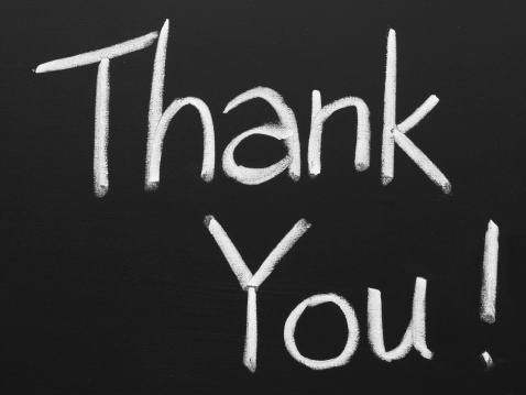 Black Board with Thank You written on it by white chalk.