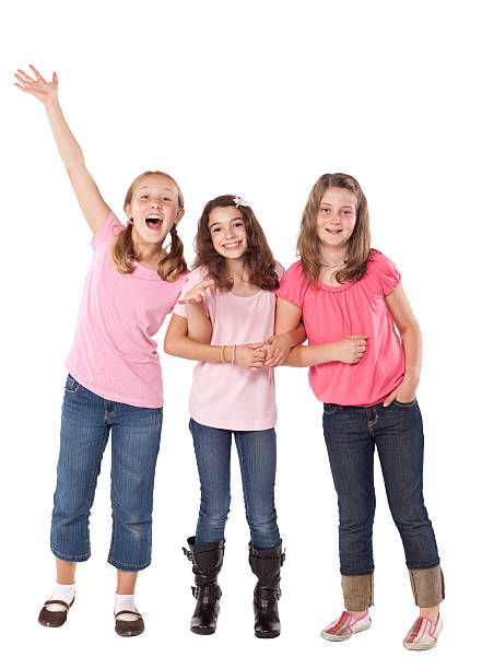 istock Studio shot of three young girls on white background 184297905