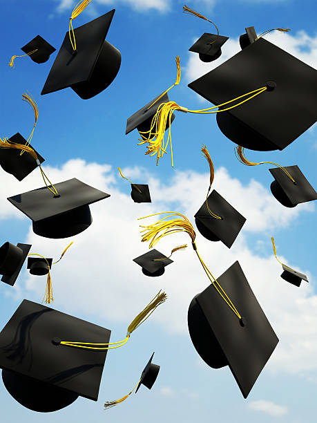 Graduation caps thrown in the air See Horizontal Image throwing photos stock pictures, royalty-free photos & images