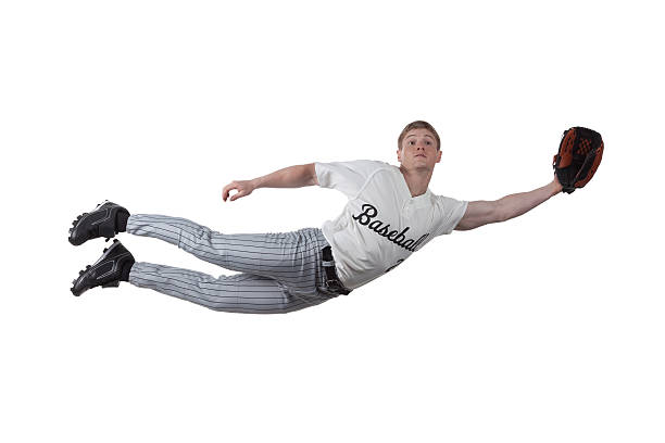 istock Baseball player diving to catch the ball 184298198