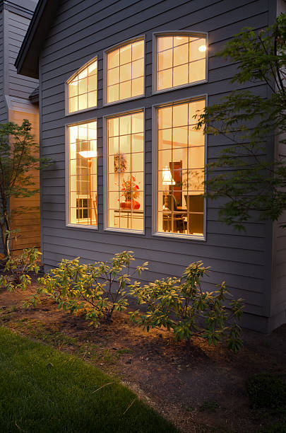 istock Twilight exterior of home and landscape 184298331