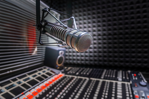 Professional microphone and sound mixer in studio