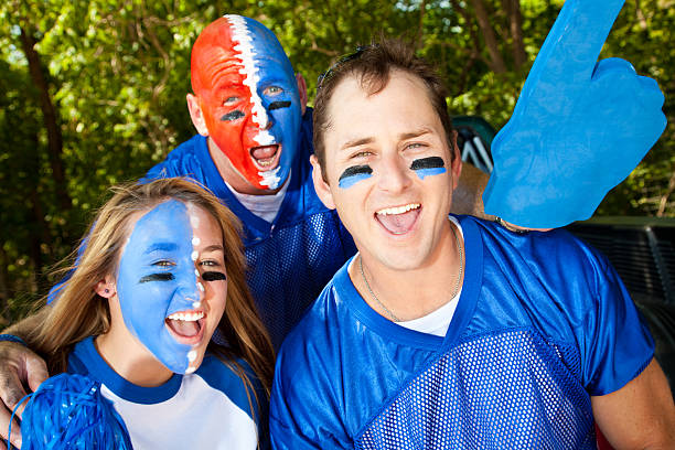 istock Happy Fans Yelling Together at Tailgate Party 184298553