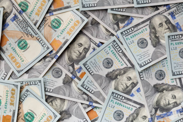 istock Background of 100 dollar bills 1842986005