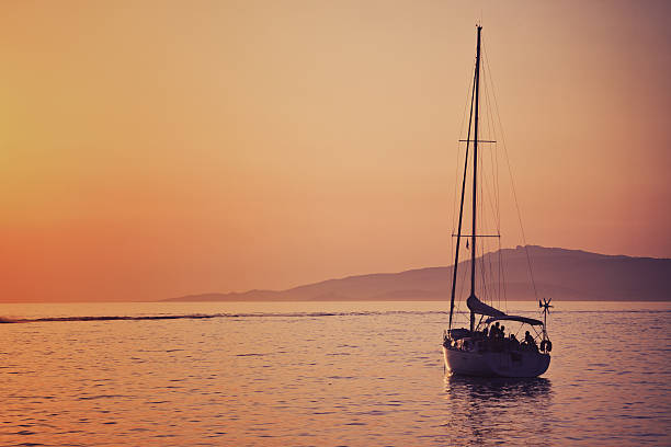 istock sailing boat anchored at the mykonos bay 184298920