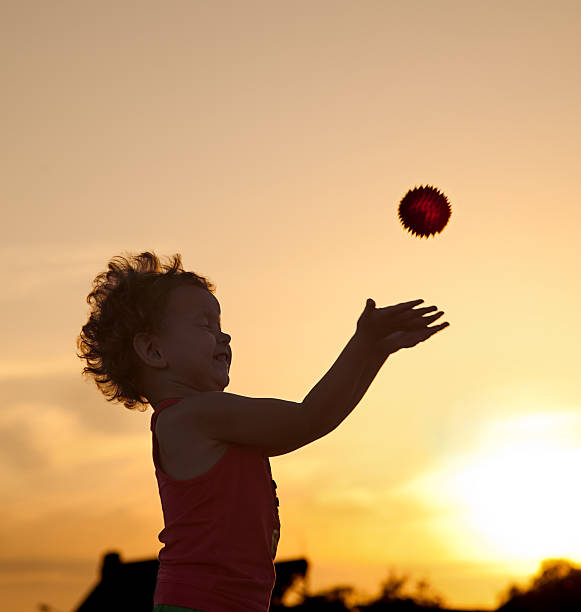 istock Little girl at sunset 184298923