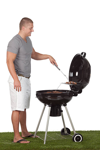 istock Man cooking on barbecue grill 184299370