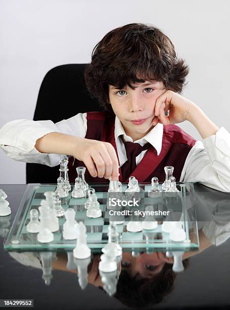 Handsome Male Model Considers His Next Chess Move Stock Photo