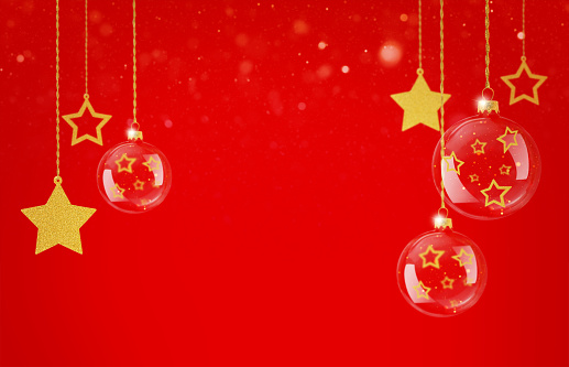 Abstract Christmas background with hanging ornaments and glittering stars. Christmas red background with copy space