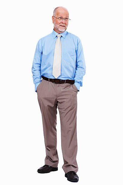 istock Male executive standing with hands in pockets 184300374