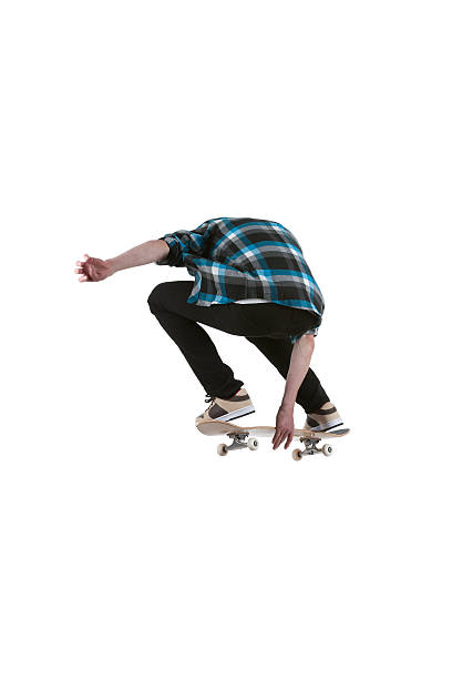 istock Rear view of a man skateboarding 184300690