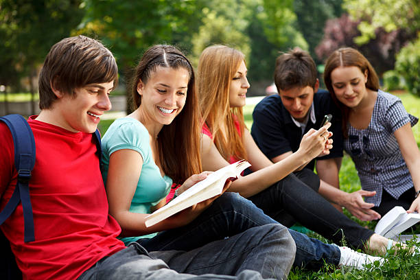 istock Group of college students studying at campus 184301081