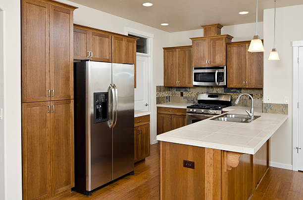 istock Modern kitchen with hardwood cabinets and floor 184301226