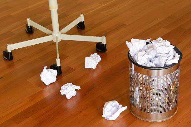 istock Office chair on hardwood floor with garbage can 184301455