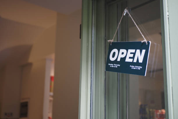 istock Open sign hanging front of cafe . 1843015913