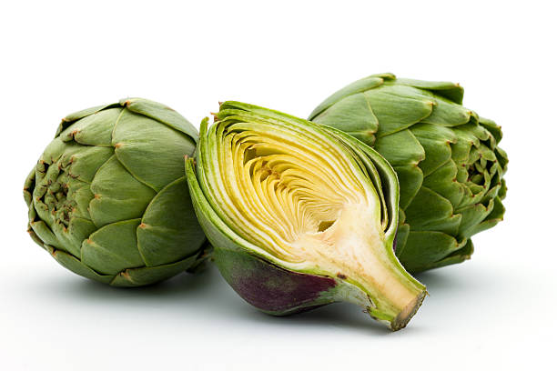 Close-up of fresh artichokes on white background file_thumbview_approve.php?size=1&id=17000134 artichoke stock pictures, royalty-free photos & images